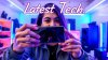 Tech reviewer unboxing a sleek new smartphone glow_3.jpg